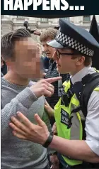  ??  ?? CONFRONTAT­ION: An officer tries to calm a protester in London this month