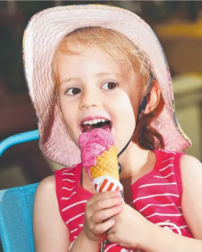  ?? CHILLED: Isla Carless, 4, from Pallarenda, cools off with an ice cream ahead of the heatwave. Picture: SHAE BEPLATE ??