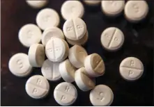  ?? KEITH SRAKOCIC - ASSOCIATED PRESS ?? This file photo shows 5-mg pills of Oxycodone. According to Gov. Andrew Cuomo, opioid overdose deaths among New York residents, outside New York City, declined 15.9 percent in 2018 compared to 2017, the first decrease in 10 years.