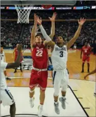  ?? BILL WIPPERT — THE ASSOCIATED PRESS ?? Although he wasn’t able to outleap Wisconsin’s Ethan Happ (22) for this rebound, Josh Hart (3) was the unquestion­ed leader for Villanova this season. The defending NCAA champion was ousted by the Badgers in Saturday’s second round, ending the careers...