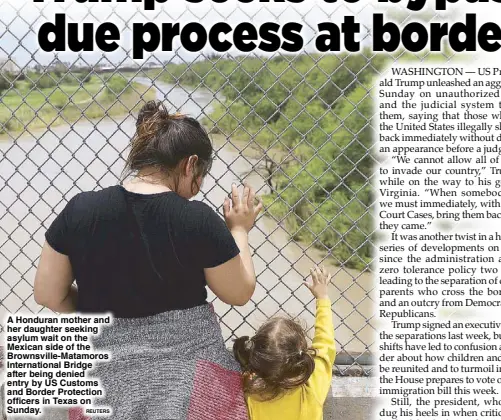  ?? REUTERS ?? A Honduran mother and her daughter seeking asylum wait on the Mexican side of the Brownsvill­e-Matamoros Internatio­nal Bridge after being denied entry by US Customs and Border Protection officers in Texas on Sunday.