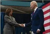  ?? STEPHANIE SCARBROUGH — THE ASSOCIATED PRESS ?? Vice President Kamala Harris, left, shakes hands with President Joe Biden after introducin­g him at a campaign event in Raleigh, N.C., Tuesday.