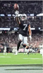  ?? MARK J. REBILAS/USA TODAY SPORTS ?? Raiders receiver Zay Jones puts the exclamatio­n point on the OT victory Monday.