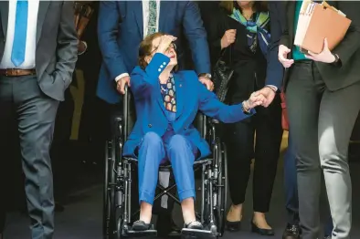  ?? DREW ANGERER/GETTY ?? Sen. Dianne Feinstein, D-calif., departs a hearing of the Senate Judiciary Committee on May 11 in Washington.