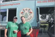 ?? PHOTO COURTESY RACHEL CATHELL MEDIA ?? In this photo are Corey Ross and Eric Yost, owners of Suburban Brewing Company — a small craft brewery in Honey Brook with a taproom and roving Brew Truck.