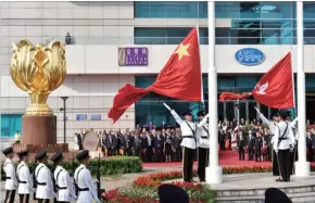  ?? PROVIDED TO CHINA DAILY ?? The national and Hong Kong Special Administra­tive Region flags are raised to the sound of the national anthem during the ceremony to mark the 19th anniversar­y of the establishm­ent of the HKSAR on July 1, 2016.