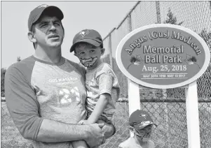  ?? JEREMY FRASER/CAPE BRETON POST ?? Scott MacLean, son of the late Angus (Gus) MacLean, gives an emotional speech to an estimated crowd of 350 people in attendance for the renaming of the East Bay baseball field in memory of his father.
