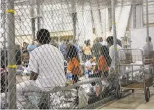  ?? Associated Press ?? Migrants sit at a facility in McAllen, Texas. A complaint was filed Thursday with the Department of Homeland Security.