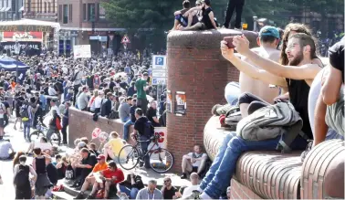  ??  ?? A demonstrat­or takes a selfie as he waits for a protest against the G-20 Summit in Hamburg, northern Germany. (AP)