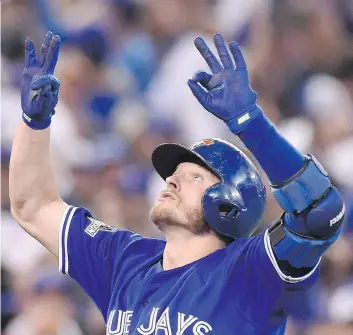  ?? THE CANADIAN PRESS ?? Blue Jays third baseman Josh Donaldson was named the American League’s MVP on Thursday, ahead of Mike Trout of the Anaheim Angels. Donaldson received 23 of 30 first-place votes.