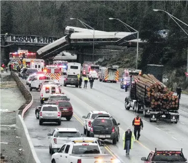  ?? RACHEL LA CORTE / THE ASSOCIATED PRESS ?? A key question for investigat­ors of the derailment in Washington state will be why the Positive Train Control (PTC) was not activated. PTC is a technology that automatica­lly slows a train if it is going too fast or could possibly derail.