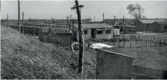  ?? PHOTO: LEN WOOD COLLECTION ?? An ‘‘unauthoris­ed’’ view of Paiaka Camp, presumably taken outside the wire from an adjoining stopbank, by an unknown photograph­er.