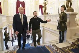  ?? AP photo ?? U.S. President Joe Biden (left), meets with Ukrainian President Volodymyr Zelenskyy at Mariinsky Palace during an unannounce­d visit in Kyiv, Ukraine on Monday.