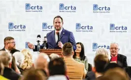  ?? PHOTOS BY NICK GRAHAM / STAFF ?? Butler County Regional Transit Authority Executive Director Matthew Dutkevicz speaks during a groundbrea­king ceremony for Chestnut Street Station in Oxford. “We’re so excited to be able to stand on a shovel today,” he said.