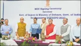  ?? PTI ?? Defence minister Rajnath Singh and Gujarat CM Vijay Rupani at the MOU signing between Ministry of Defence and state govt.