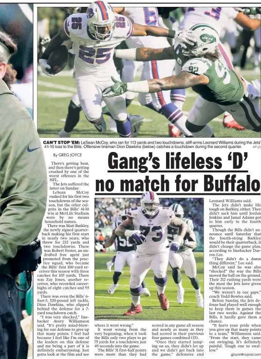  ?? AP (2) ?? CAN’T STOP ’EM: LeSean McCoy, who ran for 113 yards and two touchdowns, stiff-arms Leonard Williams during the Jets’ 41-10 loss to the Bills. Offensive lineman Dion Dawkins (below) catches a touchdown during the second quarter.