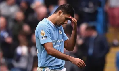  ?? Photograph: Oli Scarff/AFP/Getty Images ?? Rodri is sent off against Nottingham Forest; the Manchester City player may be pleased with therest after playing 68 matches last season.