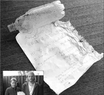  ?? — Submitted photos ?? Brigitte Bjarnason and her 22-year-old son Sven hold the Newfoundla­nd message they uncovered from a plastic bottle in Iceland.