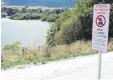  ?? PHOTO: TRACEY ROXBURGH ?? Not here . . . Signs at the entrance to the northern end of Lake Hayes advise freedom campers they’re no longer welcome there.