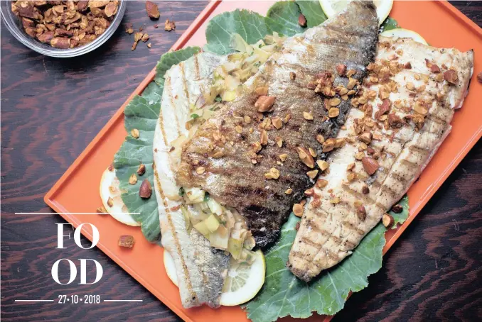  ?? | Picture Deb Lindsey. Food styling Bonnie Benwick The Washington Post ?? Herb-stuffed trout with savoury almond granola.