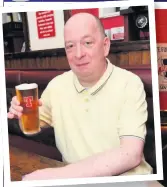  ??  ?? Cheers CheersWinn­ing Winning voter Derick Reynolds raises a glass to his favourite boozer