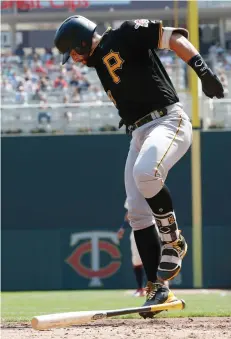 ?? Associated Press ?? ■ Pittsburgh Pirates' Francisco Cervelli reacts after fouling a ball off his leg on a pitch by Minnesota Twins pitcher Jose Berrios in the third inning of a baseball game Wednesday in Minneapoli­s.
