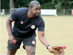  ??  ?? Glove story: MCC Young Cricketers coach Mark Alleyne