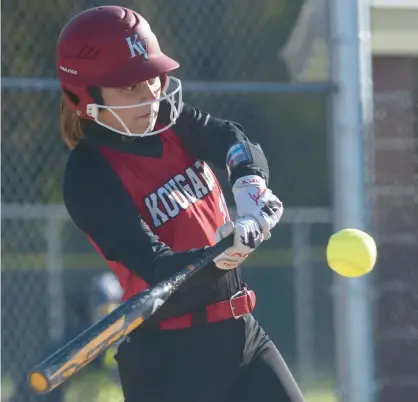  ?? KYLE TELECHAN/ POST-TRIBUNE ?? Kankakee Valley’s Carmen Rosado swings at a pitch during a 2021 game at Hobart.