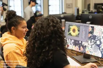  ?? ?? Alysha Clark selects a flower to be used on the cropped top she designed.