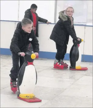  ??  ?? n RINK RESULT: Figures show thousands more people enjoyed this year’s Uxbridge ice rink than last year