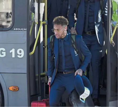  ??  ?? There’s still time: Brazil’s Neymar arriving at Tom Jobim Internatio­nal Airport in Rio de Janeiro to depart for London to continue with their World Cup preparatio­ns on Sunday. — AP