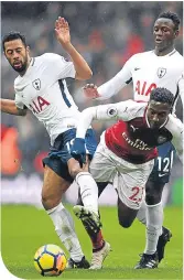  ??  ?? Mousa Dembele fouls Danny Welbeck