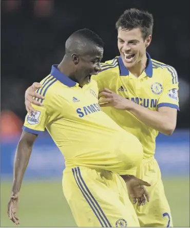  ?? Picture: Getty ?? Chelsea midfielder Ramires celebrates his goal against Leicester with Cesar Azpilicuet­a