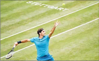  ??  ?? Roger Federer serves to Mischa Zverev during their match, at the ATP Mercedes Cup tournament in Stuttgart,
Germany on June 13. (AP)