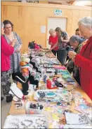  ??  ?? Fiona Kittow from Levin had the busiest stall selling jewellery and other items.
