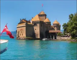  ??  ?? The castle of Chillon was built in the 12th century on a rocky island in Lake Geneva and is the most visited historic monument in Switzerlan­d.