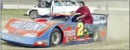  ?? TEESHA MCCLAM — THE ASSOCIATED PRESS ?? Tony Stewart takes a ride on Jeff Gordon’s car in the pit during the Nextel Prelude to the Dream in 2007at Eldora Speedway in Rossburg, Ohio.