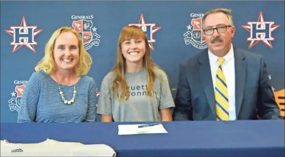  ?? Michelle Petteys, Heritage Snapshots ?? Debbie and Mike Craft were among those on hand to see their daughter, Heritage senior Allison Craft, sign on to run cross country at Truett-mcconnell University.
