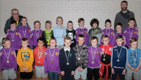  ??  ?? The Wexford Albion Under-9 squad with mentors Willie Carty and David Clancy at their end-of-season awards presentati­on in Clonard.