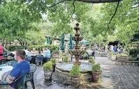  ??  ?? Don’t leave without . . . . Dining on the 1000seat, Europeanst­yle patio at Fort Worth’s famed Joe T. Garcia’s.