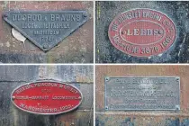  ??  ?? A combinatio­n picture shows locomotive builders’ plates from the engines of abandoned trains inside the workshop of Nepal Railways.