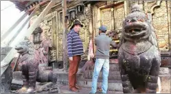  ?? AP ?? John Sanday with Anish Bhatta at Changu Narayan temple in Nepal.