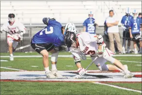  ?? Anthony E. Parelli / Hearst Connecticu­t Media ?? New Canaan’s Justin Wietfeldt, right, and Ludlowe’s Evan Rose battle for a faceoff during a game last season at New Canaan High School.