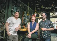  ??  ?? Rusted Mule owners Kristian Cosentino (left), Christina Mae Henderson and Chris Mansury at their bar on Sutter Street.