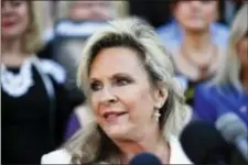  ?? BRYNN ANDERSON - THE ASSOCIATED PRESS ?? Kayla Moore, wife of former Alabama Chief Justice and U.S. Senate candidate Roy Moore, speaks at a press conference, Friday, in Montgomery, Ala.