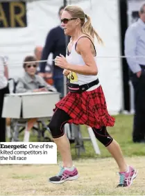  ??  ?? Energetic One of the kilted competitor­s in the hill race