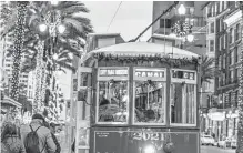  ?? New Orleans & Company ?? In the Crescent City, even the trolleys are decked out for the holiday season.