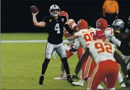  ?? JEFF BOTTARI — THE ASSOCIATED PRESS ?? Raiders quarterbac­k Derek Carr has started all 46 games under coach Jon Gruden and has missed just two regular- season games in his seven NFL seasons.