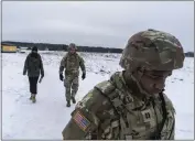  ?? BRENDAN HOFFMAN — THE NEW YORK TIMES ?? Members of the U.S. National Guard from Florida are seen near Yavoriv, Ukraine, while delivering American-provided munitions last week.