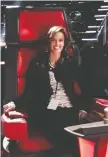  ??  ?? Vocal coach Tamara Beatty works behind the scenes on The Voice.